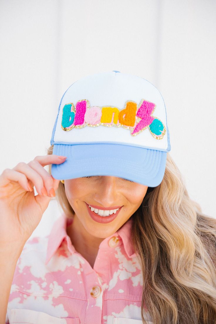 Blondes have all the fun! Complete your look with the new Blondie hat. She's perfect for the beach, gym, a hike, or just to cover up a bad hair day. We won't judge. Trendy Baseball Cap For Beach Season, Trendy Beach Baseball Cap, Fun Trucker Hat For Beach In Spring, Adjustable Blue Summer Baseball Cap, Playful Blue Hats With Upf 50+, Playful White Trucker Hat For Spring, Trendy Light Blue Beach Hat, Trendy Blue Beach Hat, Blue Baseball Cap For Summer Vacation