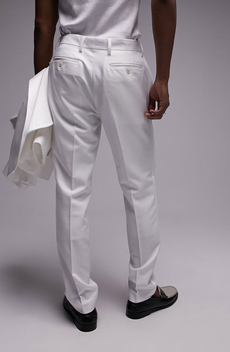 A slim fit lends contemporary appeal to bright-white tuxedo pants made from smooth, stretch-woven fabric. Zip fly with hook-and-bar closure Side-seam pockets; back button-welt pockets 77% polyester, 17% viscose, 6% elastane Machine wash, line dry Imported White Slim Fit Pants With Straight Hem, Formal White Dress Pants With Pressed Crease, White Formal Dress Pants With Pressed Crease, White Slim Fit Straight Leg Pants, White Slim Fit Straight Pants, White Slim Fit Dress Pants, White Slim Fit Bottoms With Straight Hem, White Slim Fit Bottoms For Business Casual, White Slim Fit Trousers