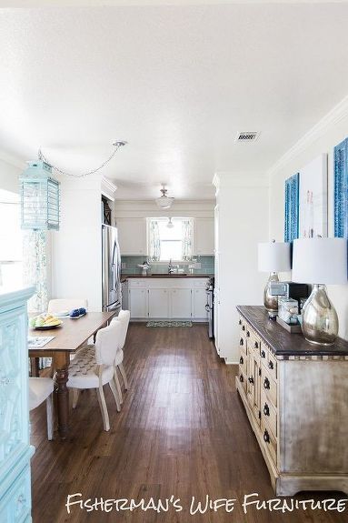 the kitchen is clean and ready to be used as a dining room or living room