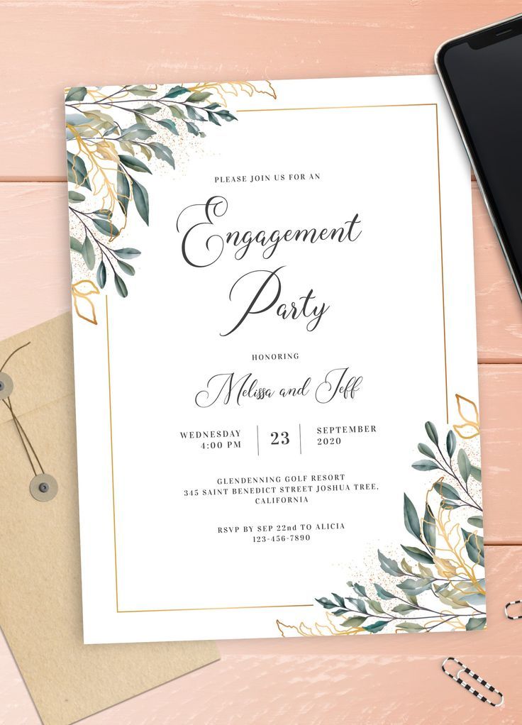 an elegant engagement party card with greenery and gold foil on it, next to a phone