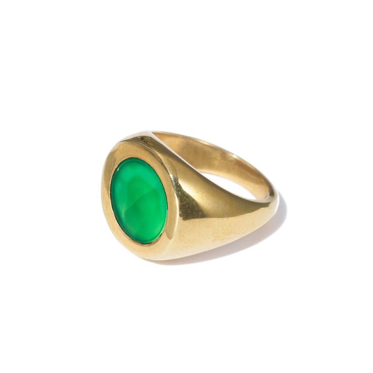 An update of an iconic style, our gold-plated Petra Circle Signet Ring surprises and delights with a beautiful green agate semi-precious stone. Worn alone or with a stack of rings, Petra always stands out. Crafted from a layer of gold over Italian brass, the Petra Circle Signet Ring is shaped and polished by hand. Details Everything you need to know. Measures 0.6" on it's face. Sizes 5-9. Handcrafted from semi-precious stones and gold plated Italian Brass in Bali. Each ring is one-of-a-kind. To Classic Green Open Signet Ring, Classic Green Jewelry With Large Stone, Green Gemstone Ring Gold-plated, Green Gemstone Gold Plated Rings, Gold Oval Chrysoprase Emerald Ring, Elegant Gold Emerald Ring With Natural Stones, Gold Agate Rings With Polished Finish, Green Signet Ring With Polished Finish For May Birthstone, Classic Chrysoprase Ring Jewelry