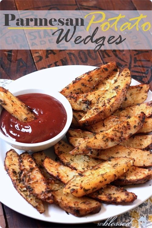 grilled parmesan potato wedges on a plate with ketchup