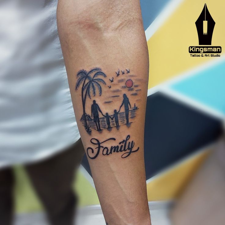 a person with a tattoo on their leg that says family and palm trees in the background