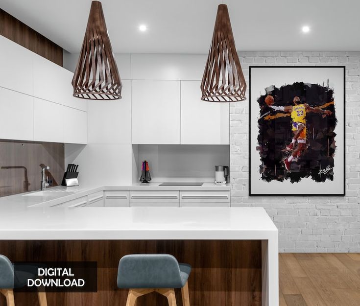 a kitchen with two stools next to a white counter top and a painting on the wall