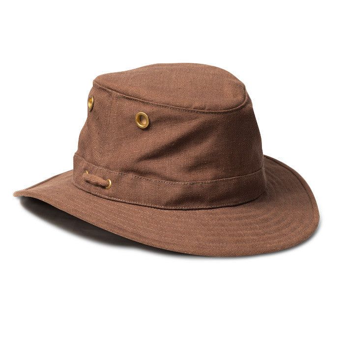 The Tilley Endurables TH5 Hemp Outdoor Mid-Brim Hiker Hat, designed with amodest brim, is made from breathable hemp fabric that is naturally resistant to UV light, mold, mildew, salt water and sweat. Although the Hemp Hats have a soft linen-like look, they are incredibly durable and strong."It may look linen, but hemp is a durable, tough as nails fabric that is well suited for outdoor and active use, whether you're out on the lake or hiking in the mountains." The hat is designed to last for years to come and will fade and soften with usage and sun-exposure. The more you wear your Tilley TH5 Hemp Hat, the more the hat forms to your unique still and provides you with long-lasting protection from the elements. All Tilley Hats come with a life-time guarantee and Tilley will repair or replace y Linen Hat, Hemp Hat, Tilley Hat, Upf Clothing, Outback Hat, Tough As Nails, Hemp Fabric, Sun Exposure, Life Time