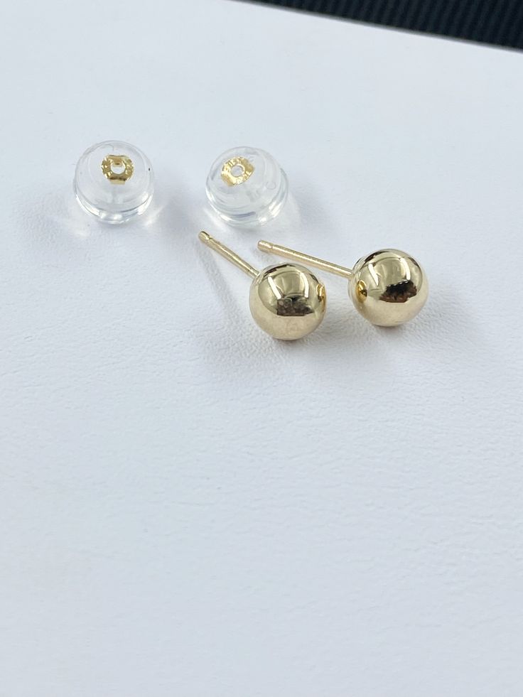 Dainty Solid Gold Bead Stud Earrings - Solid 14K Gold 5mm Round Earrings, Gold Earrings For Everyday, Stacking Earrings, Valentine's Day, Ball Earring. Simple, perfect everyday 14K gold tiny stud earrings that are the perfect gift. Tiny gold balls measure 5mm with your choice of backs. This listing is for one pair (2 pieces). Your choice of 14K gold clutch backs, 14K encased silicone backs or plain rubber backs. PLEASE convo me for custom orders. :) **PLEASE NOTE: THIS LISTING IS ONLY FOR ONE SE Everyday Gold Round Bead Earrings, Gold Round Beads Earrings For Everyday, Everyday Gold Round Beaded Earrings, Gold Hypoallergenic Round Bead Earrings, Gold Hypoallergenic Earrings With Round Beads, Gold Hypoallergenic Earrings, Everyday Yellow Gold Round Bead Earrings, Hypoallergenic Yellow Gold Round Bead Earrings, Gold Earrings With 14k Round Beads