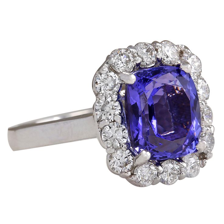 Stamped: 14K White GoldTotal Ring Weight: 5.5 GramsRing Length: N/ARing Width: N/AGemstone Weight: Total Natural Tanzanite Weight is 3.92 Carat (Measures: 9.65x8.45 mm)Color: BlueDiamond Weight: Total Natural Diamond Weight is 1.05 CaratColor: F-G, Clarity: VS2-SI1Face Measures: 14.80x13.43 mmSku: [702689W] Cushion Cut Gemstones With Prong Setting, Gia Certified Cluster Halo Ring For Formal Occasions, Formal Gia Certified Cluster Halo Ring, Fine Jewelry With Cushion Cut Tanzanite, Fine Jewelry Tanzanite Cushion Cut, Fine Jewelry Tanzanite Halo Ring, Gia Certified Sapphire Jewelry For Formal Occasions, Tanzanite Cushion Cut Ring For Anniversary, Formal Emerald Cut Sapphire Gemstones