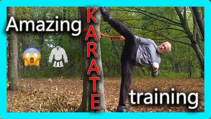 a man standing in the middle of a forest holding onto a pole with words reading amazing karate training