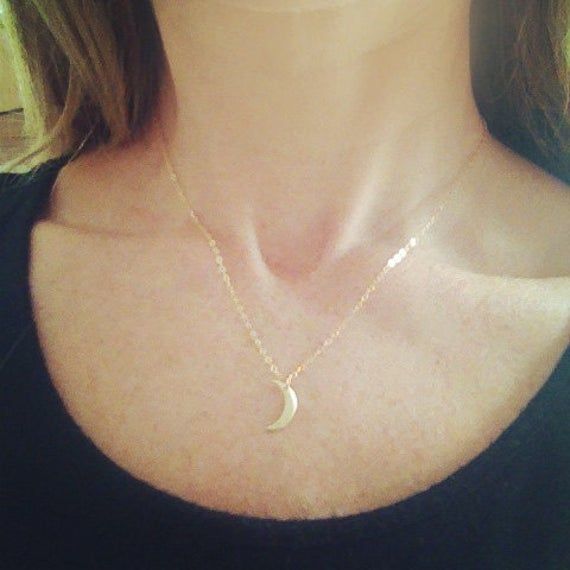 "Another version of our mini moon, this necklace features the tiniest of hand-formed bronze crescent moons. It's so delicate and dainty-a great every day piece. Layer it with larger pieces for a bohemian look. The moon measures approximately 1/2\" long and the 14k gold filled chain is adjustable from 16-18\"." Mini Moon, Franklin Tn, Crescent Moon Necklace, Bohemian Look, Moon Necklace, Gold Filled Chain, Crescent Moon, Crescent, The Moon