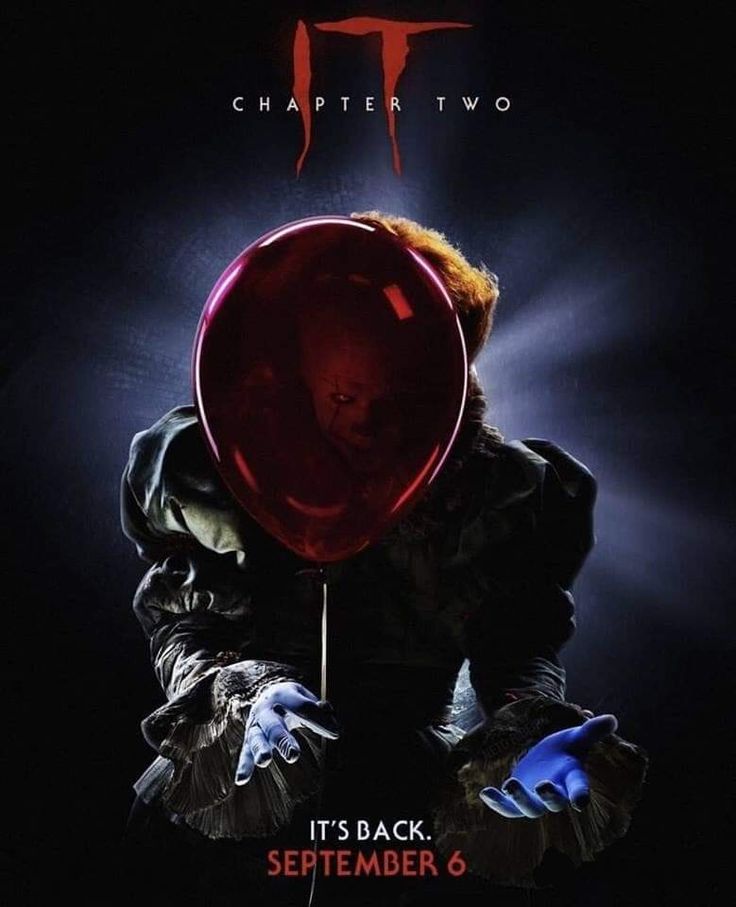 it movie poster with clown holding up a red balloon