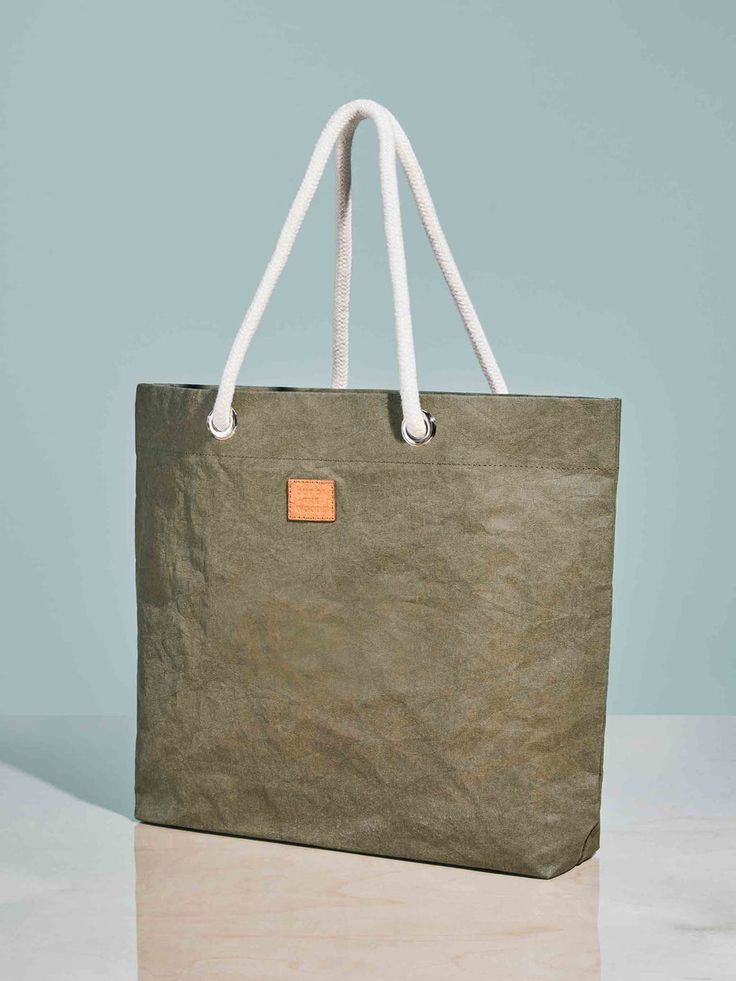 Pure Cord Shopper Grocery Bag | Reusable Sustainable Bags | Out of the Woods Large Capacity Khaki Beach Bag, Large Capacity Khaki Beach Bag For Travel, Khaki Large Capacity Beach Bag For Travel, Khaki Tote Beach Bag For Everyday, Khaki Tote Beach Bag, Summer Khaki Beach Bag For Daily Use, Casual Canvas Vacation Bag, Casual Khaki Tote Beach Bag, Trendy Khaki Beach Bag