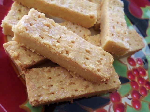 there are several pieces of food on the plate and one is cut into small squares