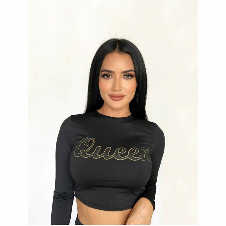 We Present Our Queen Long Sleeves Crop Top In Contemporary Black Color And A Charming Font Design On The Front To Help You Stay In Shape And Look Striking At Any Angle. Crafted From Premium Cotton For The Ultimate Comfort And Maximum Breathability, This Simple Addition Enhances Your Physique And Shows Off Your Elegant Queenly Qualities. Key Features: Cotton / Polyester Relaxed Slim Fit Crop Top Design Black All Sizes Available Fast Shipping Satisfaction Guaranteed Black Letter Print Top For Party, Stretch Crop Top With Letter Print For Night Out, Stretch Letter Print Crop Top For Night Out, Stretch Letter Print Tops For Club, Fitted Letter Print Tops For Night Out, Stretch Top With Letter Print For Night Out, Stretch Letter Print Top For Night Out, Letter Print Tops For Fall Parties, Fall Party Tops With Letter Print