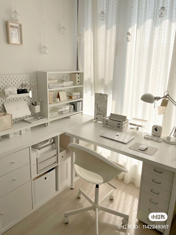 a white desk and chair in a room