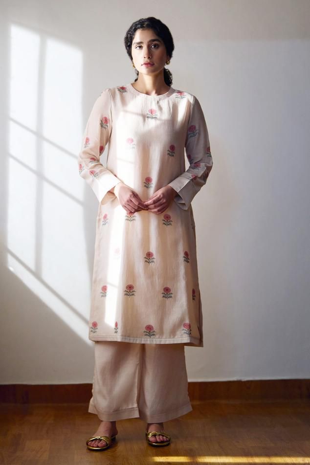 Ivory chanderi kurta with floral hand embroidery. Comes with pant.
Components: 2
Pattern: Hand embroidered
Type Of Work: Floral
Neckline: Round
Sleeve Type: Full
Fabric: Chanderi
Color: Ivory
Other Details: 
Side slits on kurta
Occasion: Puja - Aza Fashions Floral Embroidered Palazzo Set With Straight Kurta For Diwali, Diwali Palazzo Set With Floral Embroidery And Straight Kurta, Chanderi Pant Set With Chikankari Embroidery And Straight Kurta, Anarkali Cotton Pant Set With Floral Embroidery, Spring Chanderi Pant Set With Chikankari Embroidery, Chanderi Palazzo Set With Chikankari Embroidery Long Sleeve, Chikankari Embroidered Chanderi Palazzo Set With Long Sleeves, Chanderi Palazzo Set With Chikankari Embroidery, Spring Resham Embroidered Straight Kurta Palazzo Set