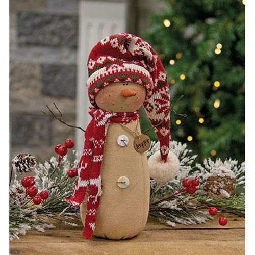 a small snowman with a red hat and scarf