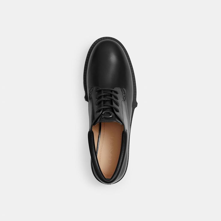 A modern take on classic oxford silhouettes our smooth leather Lyla Derby features a chunky ‘90s-inspired lug sole for subtle lift and great traction. The lace-up silhouette is finished with a comfortable padded footbed for all-day wear. | Coach Lyla Derby Shoes - Women's Size 11 - Black Derby Shoes Women, Large Wallet, 90s Inspired, Derby Shoes, Lug Sole, Merlot, New Handbags, Belt Bag, Smooth Leather