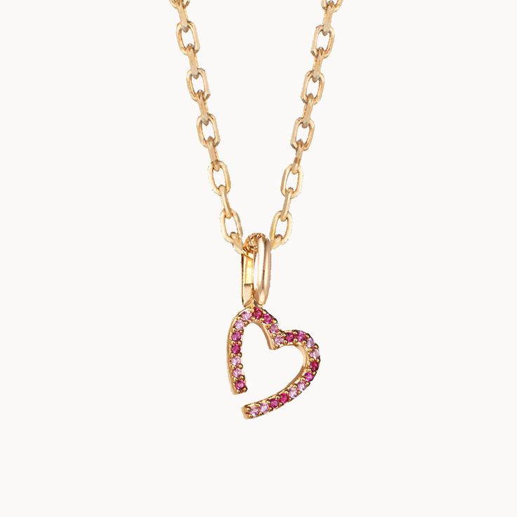 Our new Pink October M Charm Necklace is the Merci Maman Heart, in a new limited edition Pink Crystal for Pink October. This re-designed classic will add a pop of pink sparkle to all your Merci Maman jewelry.18K Champagne Gold Plated or 925 Sterling SilverPink October M Charm: 0.4x0.3 Charms are removable from this chain and can be worn on all Merci Maman chain lengthsSent with love in a complimentary gift box Fine Jewelry Pink Heart Charm, Valentine's Day Pink Sterling Silver Heart Necklace, Pink Fine Jewelry Necklace For Valentine's Day, Pink Heart Necklace For Gift, Fine Jewelry Pink Heart Charm Necklace, Pink Open Heart Necklace For Anniversary, Personalized Pink Heart-cut Necklace, Pink Double Heart Sterling Silver Necklace, Pink Sterling Silver Double Heart Necklace