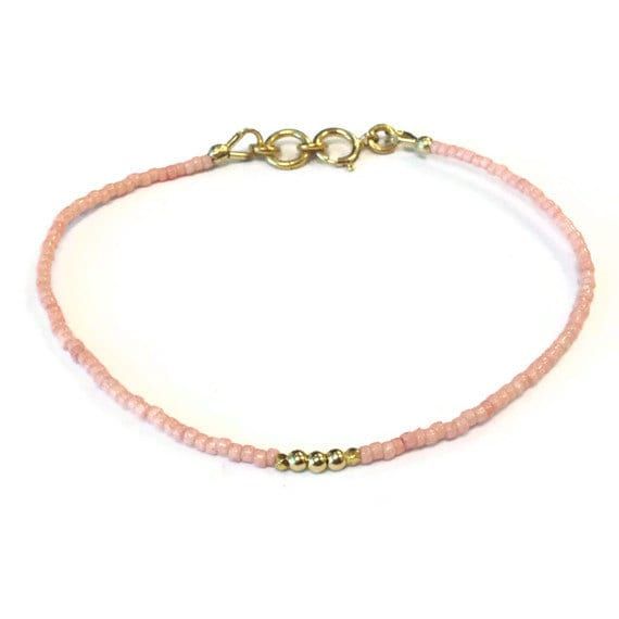 This LIGHT PINK beaded stack bracelet created by Jewelry by CARMAL is made of: light pink glass seed beads, 24K gold vermeil: tiny faceted cube beads, tiny smooth round beads, spring ring clasp closure and findings. This bracelet measures 7 1/2 inches in length. If you need a different size, please feel free to convo us!! :) NOTE: This listing is for 1 LIGHT PINK beaded stack bracelet.  This bracelet is offered in additional colors, see below. BRIGHT YELLOW:  https://www.etsy.com/listing/1064721 Bright Colors Fashion, Etsy Bracelets, Pink Beaded Bracelet, Pink Beaded Bracelets, Stack Bracelet, Blue Beaded Bracelets, Gold Vermeil Jewelry, Rose Pale, Pink Beaded