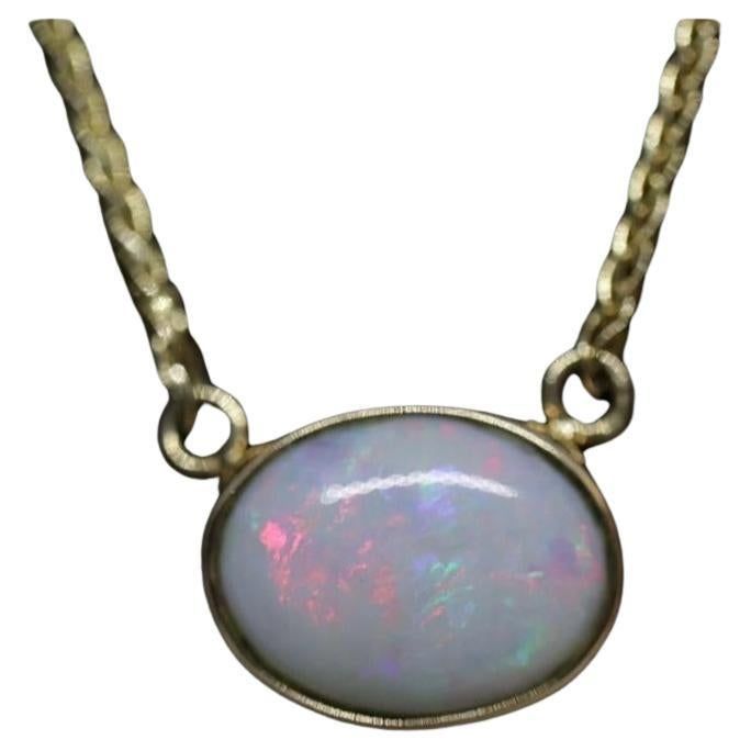 Vintage Materials: Gold, Stone Gemstone: Opal Chain style: Box Necklace length: 18 Inches Beautiful Necklace. This is the most unique OPAL pendant and necklace you will find. Opal has significant fire. Details: 14k Yellow Gold 10mm by 8mm Opal Bezel set 1mm wide box chain Chain has been repaired with an 18k ring. Adds to character of chain. Bezel Set Necklace, Journey Pendant, Unique Opal, Natural Opal Ring, Box Necklace, Style Box, Bezel Pendant, Heart Pendant Diamond, Modern Necklaces