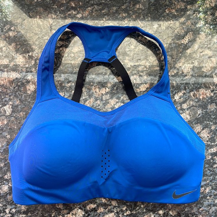 This Deep Blue Sports Bra Will Offer All The Support You Need To Crush Your Workout! Brand New, Never Worn/Used. Blue Sports Bra With Medium Bust Support, Padded Racerback Sports Activewear, Blue Racerback Sports Bra With Medium Bust Support, Blue Sports Bra With Medium Support For Workout, Blue Activewear With Medium Bust Support For Sports, Supportive Blue Sports Bra Sweat Resistant, Supportive Nike Sports Bra, Supportive Sweat-resistant Blue Sports Bra, Blue Activewear With Medium Bust Support For Workout