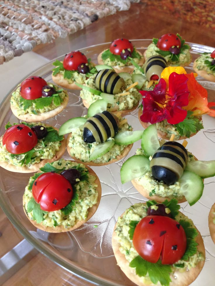 a glass plate topped with lots of food