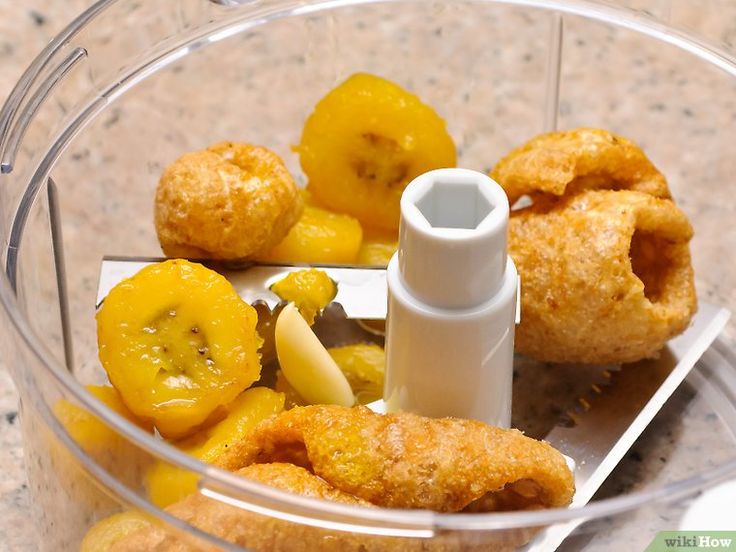 a food processor filled with doughnuts and other ingredients to make them into donuts