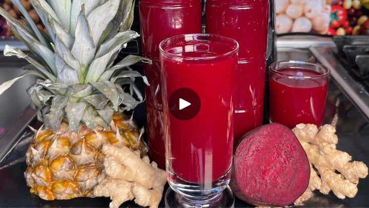 a table topped with glasses and fruit next to each other