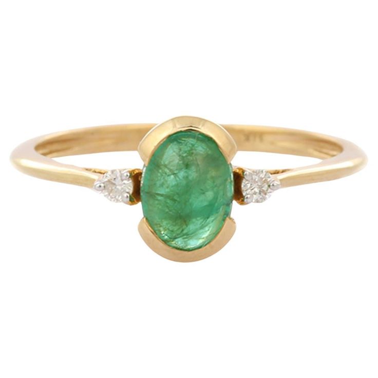 Stackable emerald and diamond three stone ring in 14K gold which perfectly goes with your personality. Three stone rings come with deeper meaning, traditionally symbolizing friendship and love. Three stone gemstone rings are a perfect choice to fulfill your engagement story. The emerald gemstone give your relationship creativity. Lightweight and gorgeous, this is a perfect bridesmaid, wedding gift for anyone on your list. PRODUCT DETAILS :- > Material - 14K Solid Yellow Gold > Gemstone - Emerald Engagement Story, Half Bezel Setting, Diamond Three Stone Ring, Deeper Meaning, Gold Gemstone Ring, Three Stone Ring, Yellow Gold Engagement Rings, Bridesmaid Wedding, Three Stone Engagement Rings