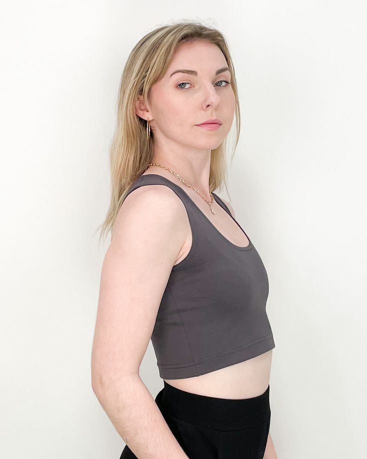 TO TRANSFORM: Wear with the high neckline in the front or flip it around and bring the scoop neck to the front and show a little chest. Sparrow crop is a cool, cropped version of our Sparrow top. PRODUCT DETAILS: - 60% Rayon, 33% Nylon, 7% Lycra- Moisture wicking and four-way stretch - Machine washable and dryer safe - MADE IN USA - Model: Talia is wearing a size small View our shipping and returns policy We'd love to hear from you! Email hello@paridaez.com with any questions. Versatile Sleeveless Crop Top With Built-in Bra, Versatile Stretch Crop Top With Built-in Bra, Scoop Neck Crop Top With Built-in Bra, Scoop Neck Seamless Crop Top For Yoga, Yoga Scoop Neck Seamless Crop Top, Versatile Cropped Tops With Built-in Bra, Fitted Crop Top With Built-in Bra And Scoop Back, Bra-friendly Scoop Neck Crop Top For Yoga, Bra Friendly Scoop Neck Crop Top For Yoga