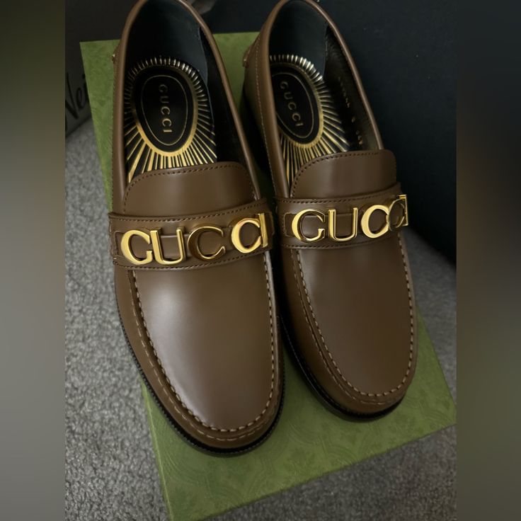 Brand New Men Gucci Loafers. Gucci Calf Leather Loafers With Rubber Sole, Luxury Wingtip Loafers, Luxury Calf Leather Tassel Loafers With Round Toe, Luxury Calf Leather Wingtip Loafers, Gucci Loafers In Calf Leather, Gucci Calf Leather Loafers With Branded Insole, Gucci Calf Leather Loafers, Luxury Tassel Loafers With Brogue Detailing, Designer Slip-on Loafers With Leather Lining