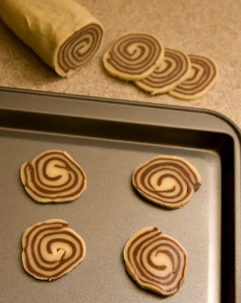 some food is laying out on a baking sheet and ready to be baked in the oven