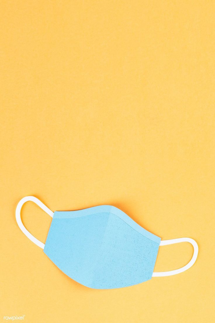 a blue face mask on a yellow background