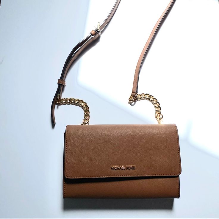 Brand New Crossbody Bag. Beautiful Brown. Adjustable And Removable Strap. Detachable Card Wallet Inside. Michael Kors Crossbody Travel Bag, Michael Kors Travel Shoulder Bag With Phone Holder, Michael Kors Shoulder Bag For Travel With Phone Bag, Michael Kors Crossbody Shoulder Bag With Mobile Phone Bag, Michael Kors Shoulder Bag With Mobile Phone Bag, Michael Kors Crossbody Mobile Phone Bag, Michael Kors Mobile Phone Crossbody Bag, Michael Kors Crossbody Bag With Removable Pouch, Michael Kors Leather Shoulder Bag With Mobile Phone Holder