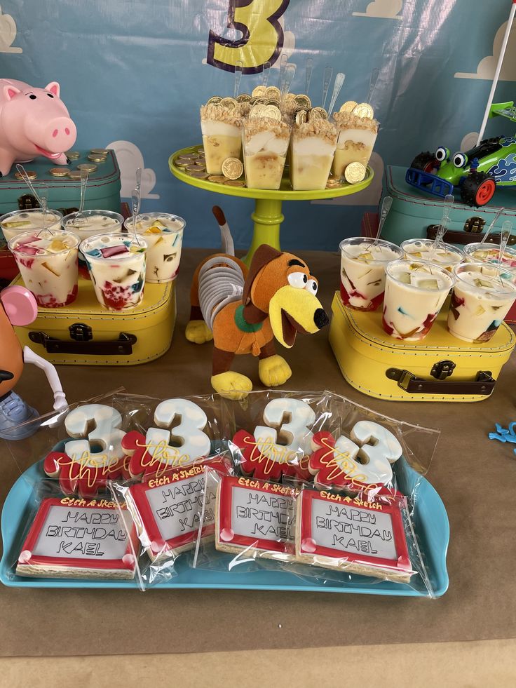 the dessert table is set up to look like winnie the pooh's birthday party