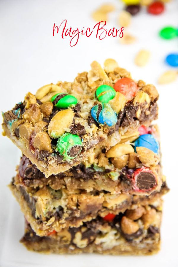 three pieces of cookie bars stacked on top of each other with m & m candies