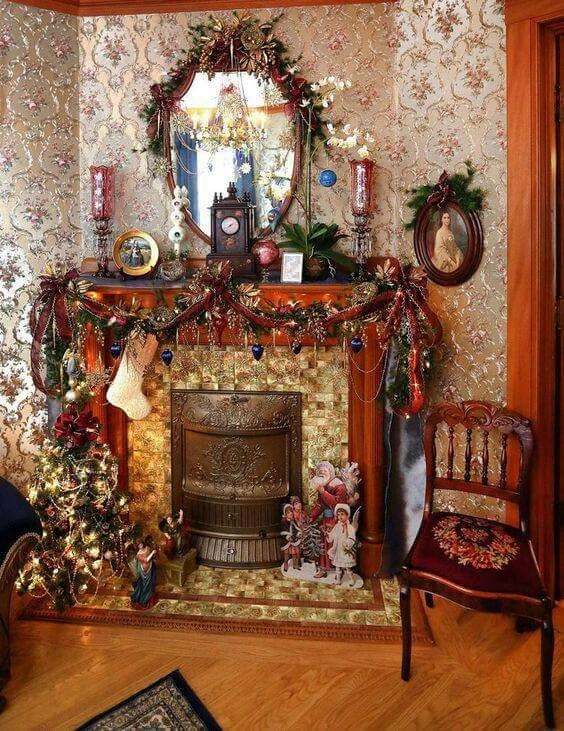 a living room with a fire place and christmas decorations