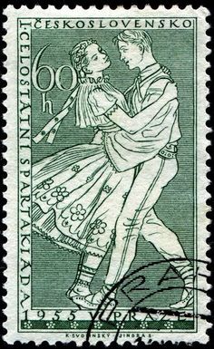 an old postage stamp with a man and woman dancing