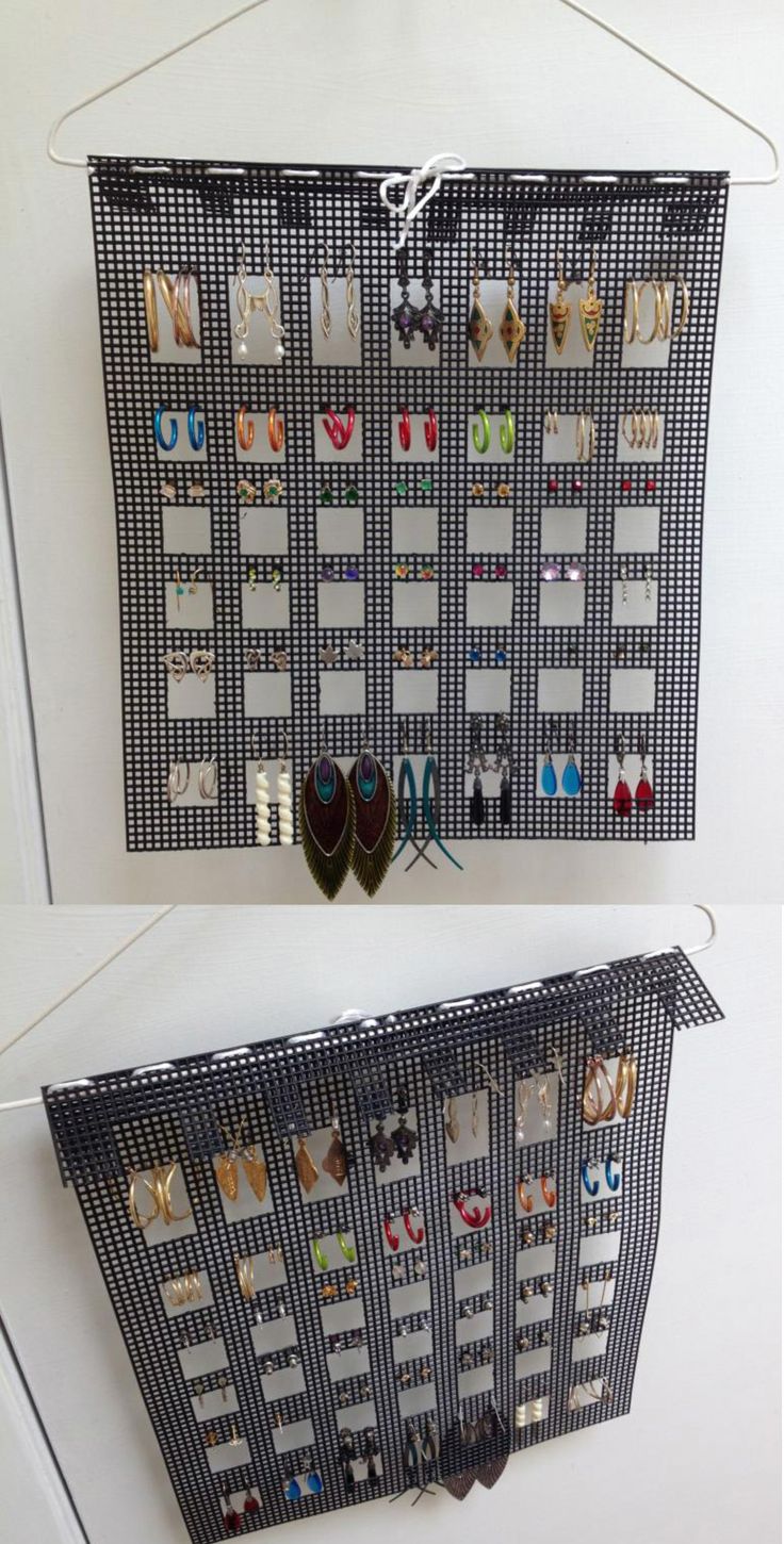 the wall is decorated with many pairs of shoes hanging from it's pegs