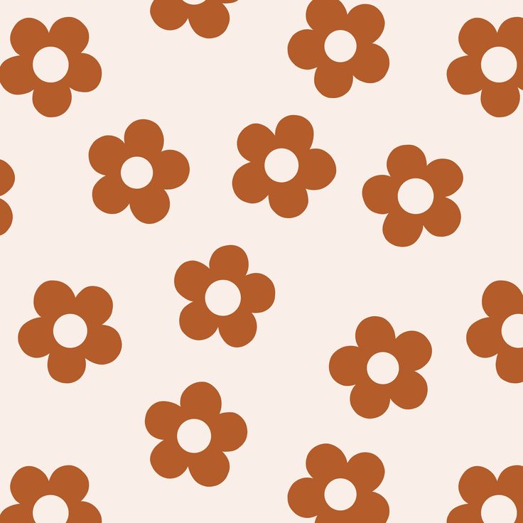 an orange and brown flower pattern on a white background is featured in this image, it appears to be very simple