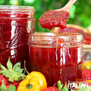 strawberry habanero everything spread in jars and spoon with strawberries on the side