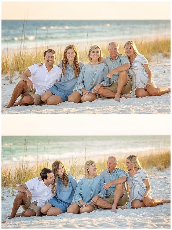 a family sitting together on the beach at sunset