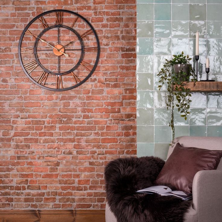 a living room with a brick wall and large clock on the wall, along with a fur rug