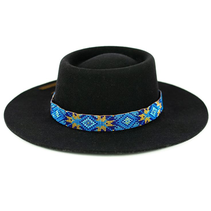 Dress up any hat with this western beaded leather hat band. Beautiful native and Navajo patterns with vibrant colors. Bring a southern charm to your old favorites with this gorgeous hat band or make your new hat even more special. Made of full grain leather (highest grade leather) and glass beads. Handmade in Brazil by artisan women. You can match your hat band with our best-selling leather beaded dog collars! Treated with beeswax, water resistant. 30 days free returns or exchange. 1-year ... Bohemian Black Hat Band For Western-themed Events, Bohemian Black Hat Bands For Ranch, Handmade Southwestern Blue Hat Band, Western Multicolor Hat Bands For Rodeo, Handmade Multicolor Hat Bands For Rodeo, Western Multicolor Hat Bands For Country Events, Western Style Multicolor Hat Bands For Country Events, Western-style Multicolor Hat Bands For Country Events, Black Southwestern Style Hat For Festival