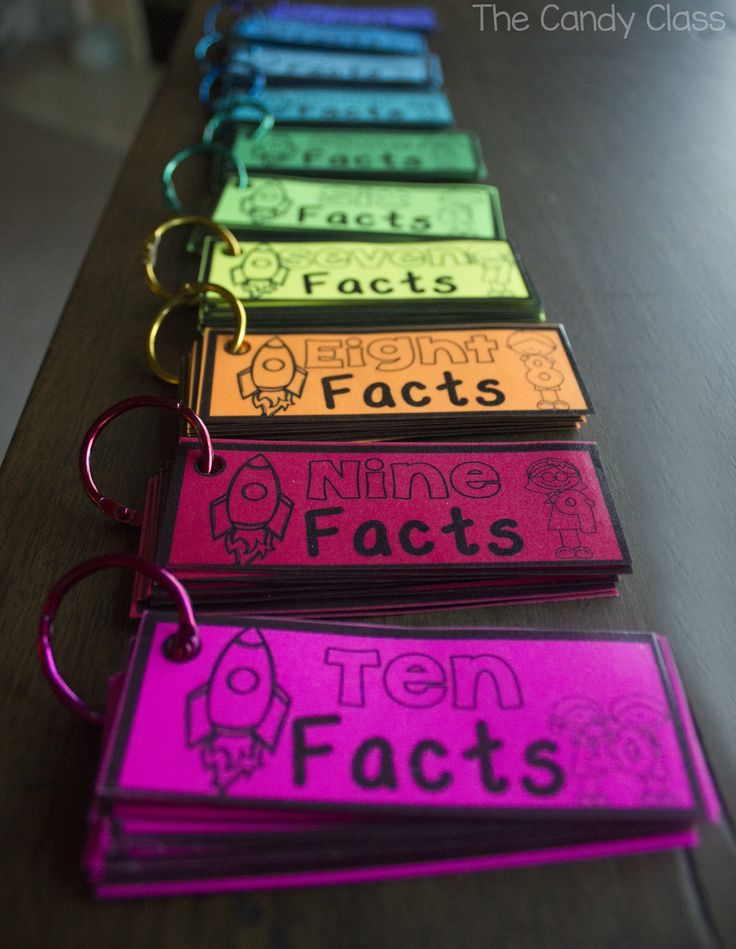 the name tags are all different colors and have black letters on them that spell out words