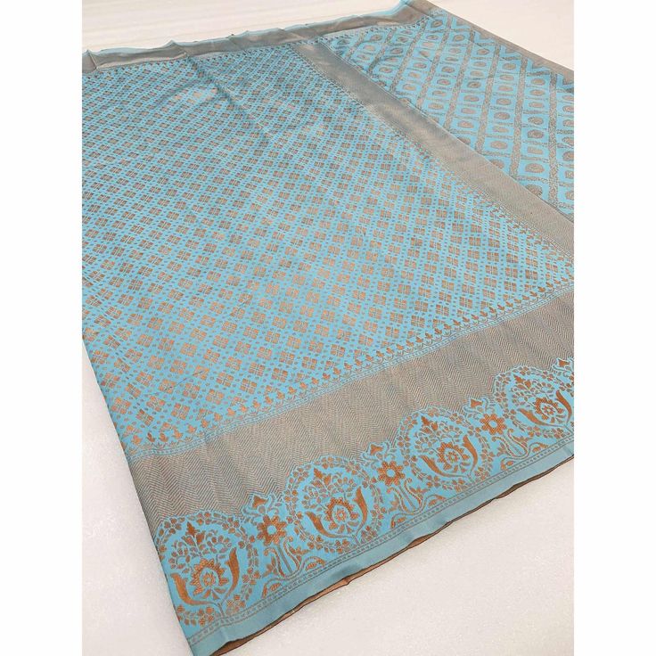 Light Blue colored saree is made from banarasi silk fabric which is highlighted with beautiful weaving work as shown. Comes along with unstitched banarasi silk blouse piece which you can customise as per your design/style. Occasion - You can wear this saree for festivals and functions. Note:- the actual product may differ slightly in color and design from the one illustrated in the images when compared with computer or mobile screen. Measurements: Saree : Banarasi Silk : 5.5 Mtrs Blouse : Banarasi Silk : 0.8 Mtr Material: Banarasi Silk Stitch Type: Unstitched Country of Origin: India Care Guide: Dry Clean Blue Saree Blouse With Traditional Patterns, Blue Handloom Dupatta For Traditional Ceremonies, Traditional Light Blue Blouse Piece With Cutdana, Blue Saree With Traditional Patterns For Festivals, Traditional Light Blue Blouse With Dupatta, Blue Saree For Traditional Ceremonies, Traditional Light Blue Zari Work Blouse Piece, Blue Katan Silk Saree Blouse Piece, Blue Chanderi Blouse Piece With Traditional Patterns