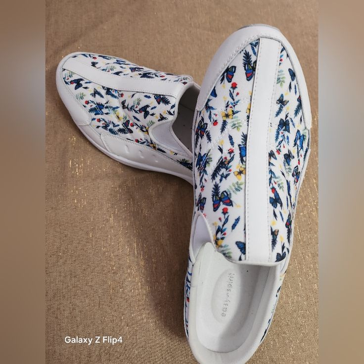 Brand New Comfortable White Slip-ons With Flat Heel, White Closed Toe Slip-ons For Spring, Comfortable White Slip-ons For Spring, Blue Cushioned Slip-ons For Spring, White Low-top Slip-ons For Summer, White Flat Heel Slip-ons For Spring, White Slip-on Shoes, White Cushioned Slip-ons For Spring, Blue Low-top Slip-ons For Spring