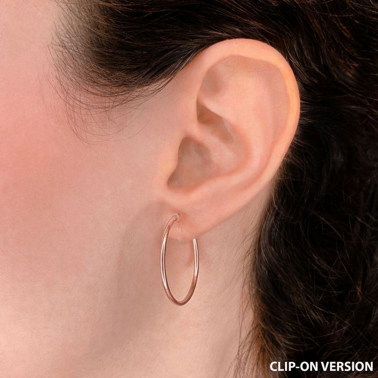 These rose gold clip-on hoop earrings are super comfortable and feature our signature invisible clip, making them look just like real pierced hoop earrings. Formerly known as the "everyday hoop earrings." Also comes in a textured version, mini version, smaller version and larger version. Available as hypoallergenic pierced earrings and comfy clip-on earrings. Medium Hoop Earrings, Gold Clips, Earring Tutorial, Cuff Rings, Pierced Earrings, High Quality Jewelry, Earings Piercings, 18k Rose Gold, Ring Necklace