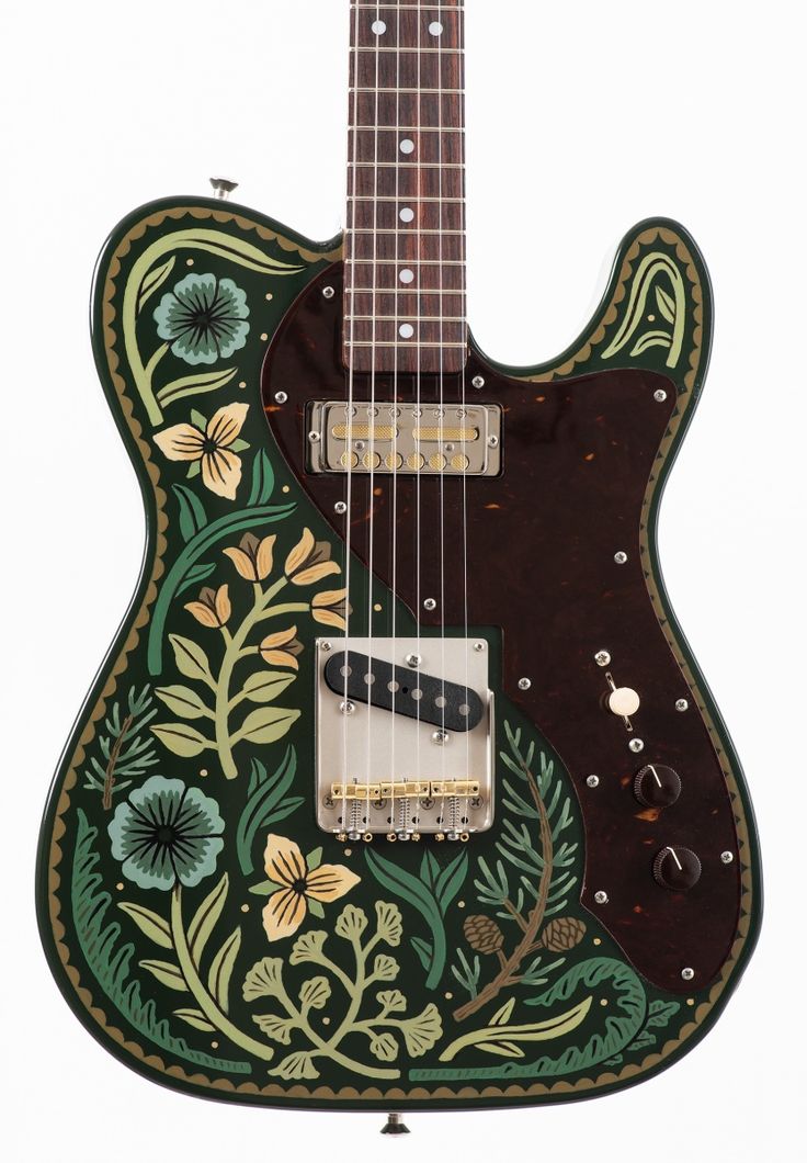 an electric guitar is decorated with flowers and leaves on it's body, as well as the frets