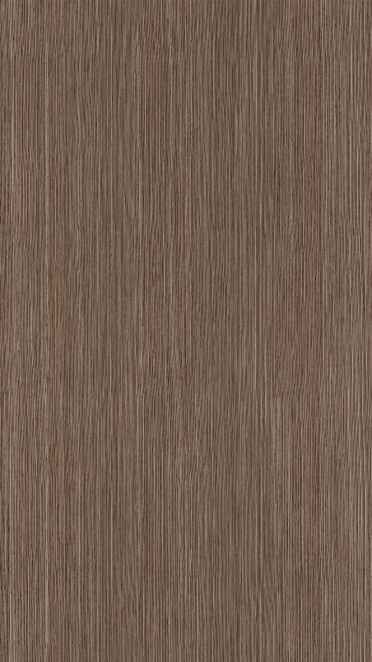 a close up view of the wood grain pattern on a surface that is very dark brown